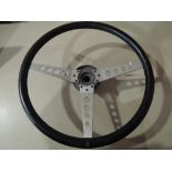 A new old stock 15'' three spoke steering wheel for Jaguar cars