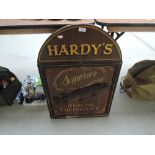 A vintage wooden Hardy's Fishing Tackle sign