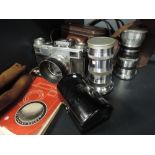 A Zeiss Ikon Contax Rangefinder camera with Universal turret, Carl Zeiss Jena Sonnar 5cm lens, and