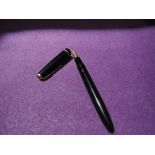 A Parker Duofold fountain pen in black with single gold band on cap