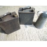 A selection of gallon fuel and petrol cans including Esso