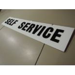 A vintage shop or factory sign with raised acrylic lettering reading Self Service