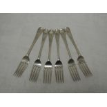 A set of six silver dessert forks of plain form monogrammed R to terminals, London 1924, Josiah