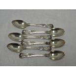 A set of six Georgian silver dessert spoons in the Kings pattern bearing small crest to terminals,