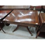 A 20th century mahogany period style sofa table having flap top with frieze drawers and splay legs