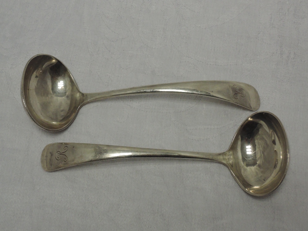 A pair of silver sauce ladles bearing monogram R to terminals, Birmingham 1954, Barker Brothers