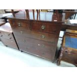 An Edwardian mahogany bedroom chest of two short and three long drawers having crossbanded