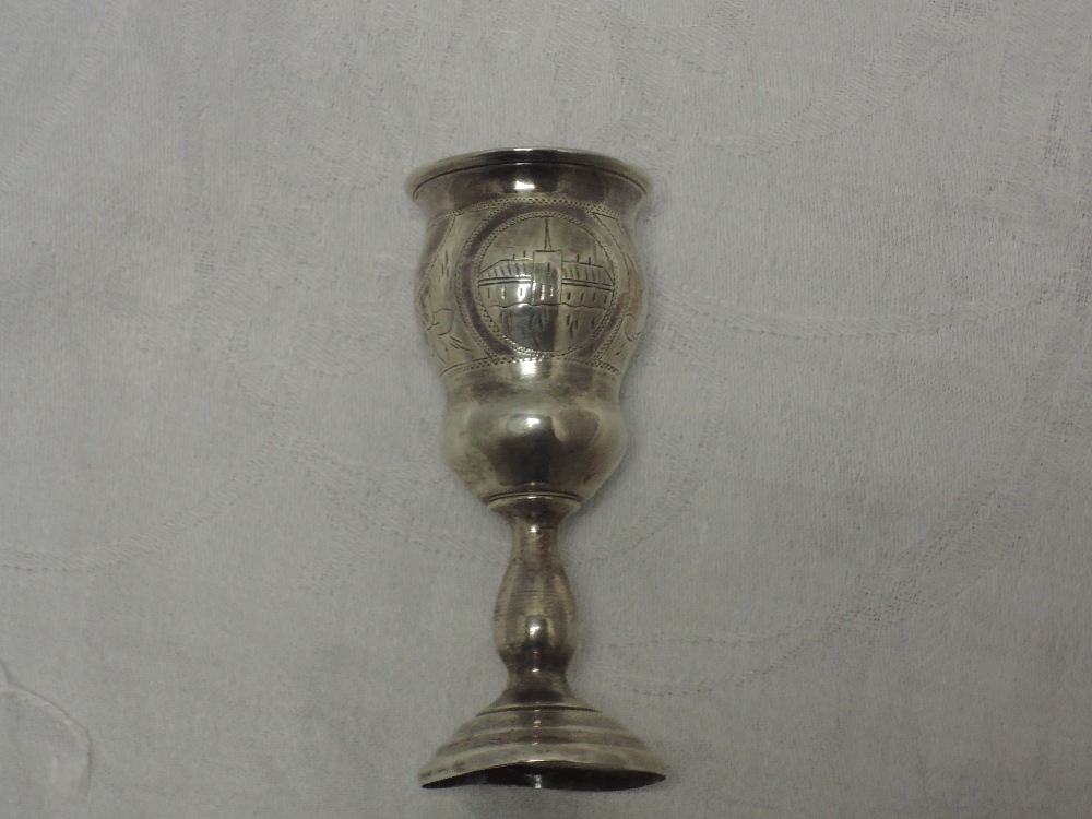 A small Russian silver vodka goblet having scenic engraving with baluster stem to stepped circular - Image 2 of 4