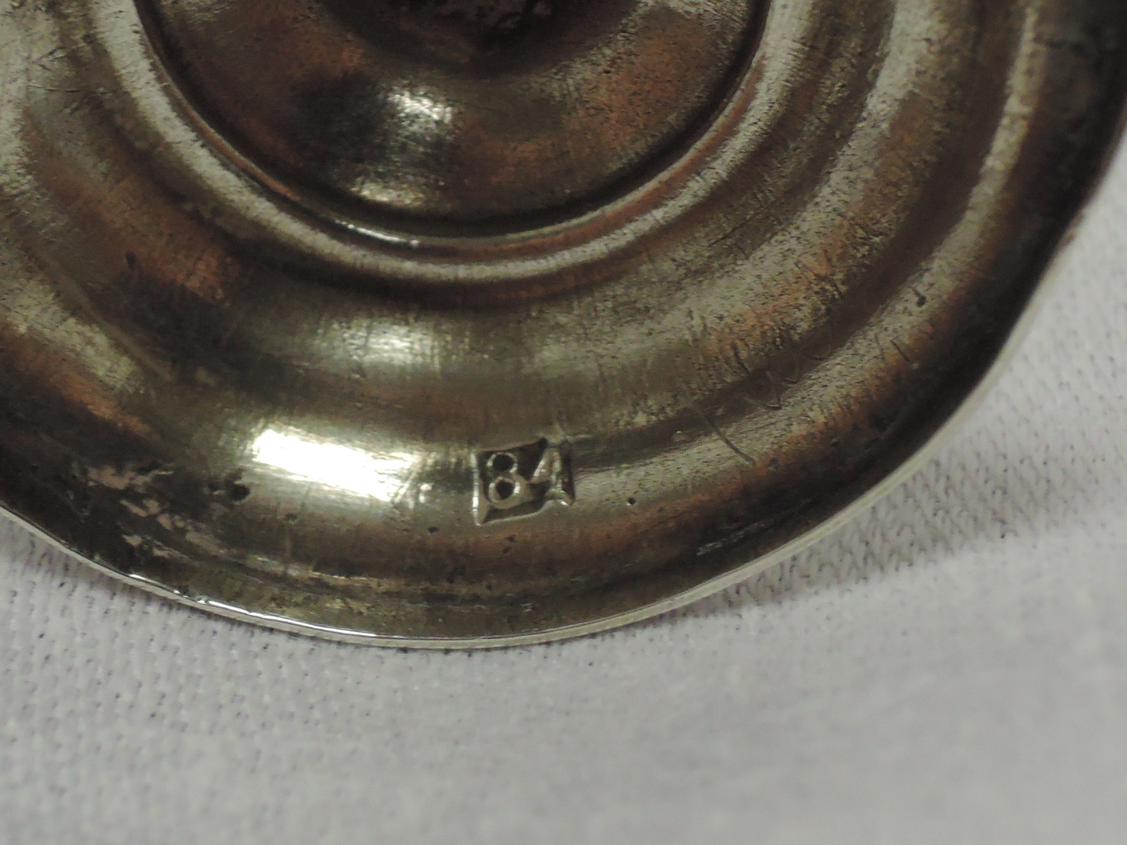 A small Russian silver vodka goblet having scenic engraving with baluster stem to stepped circular - Image 4 of 4