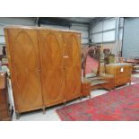 A mid 20th century sapele and kingwood bedroom suite having floral and mother of pearl inlay