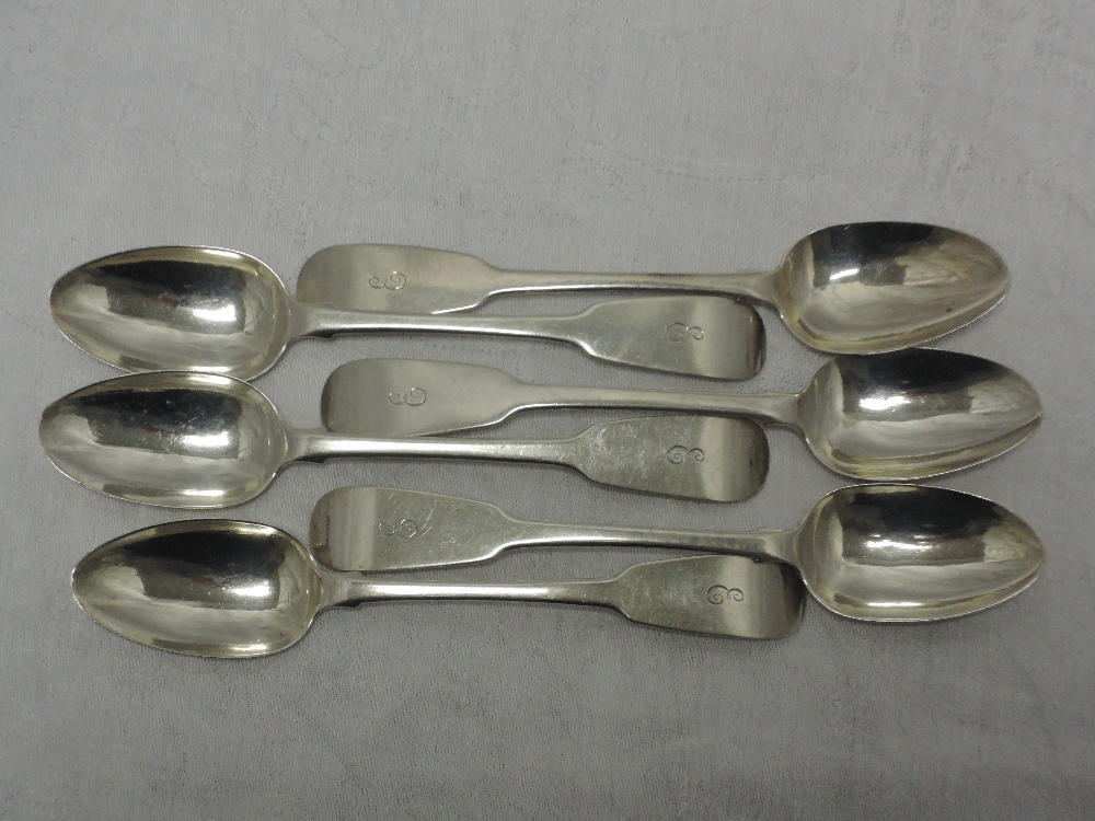 A set of six Georgian Irish silver teaspoons of fiddle back form bearing monogram E to terminals,