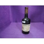 A bottle of Ferreira Port, Vintage 1963, cork leakage, level shoulder of neck