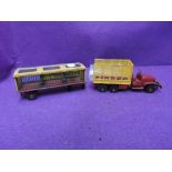 A French playworn Super Dinky Pinder Circus Truck & Trailer with animals
