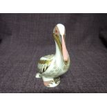 A Royal Crown Derby Paperweight. White Pelican modelled and decoration design by John Ablitt.
