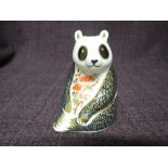 A Royal Crown Derby paperweight. Panda modelled by Robert Jefferson and decoration design by Rita