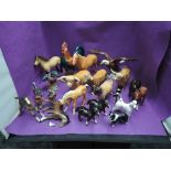 Thirty Beswick studies all (af) including Highland Cattle, Huntsman Wall plaque, Rearing Huntsman,