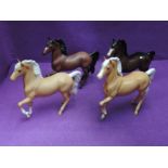 Four Beswick/Royal Doulton studies, Palomino Prancing Arab Types, second versions, palomino gloss,