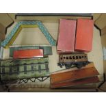 A Bing 0 gauge coach, two Hornby boxed wagons and a 0 gauge bridge, platform and foot bridge