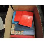 A box of World stamps loose and in albums, mint & used
