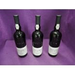 Three bottles of Taylor's 2000 vintage Port, bottled in 2002, 75cl, 20.5% vol with wood crate