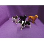 Four Beswick and Royal Doulton studies, Cocker Spaniels, black, golden brown and liver & white