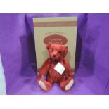 A modern Steiff limited edition 1998 Burgundy 40 Teddy Bear having growling mechanism and white