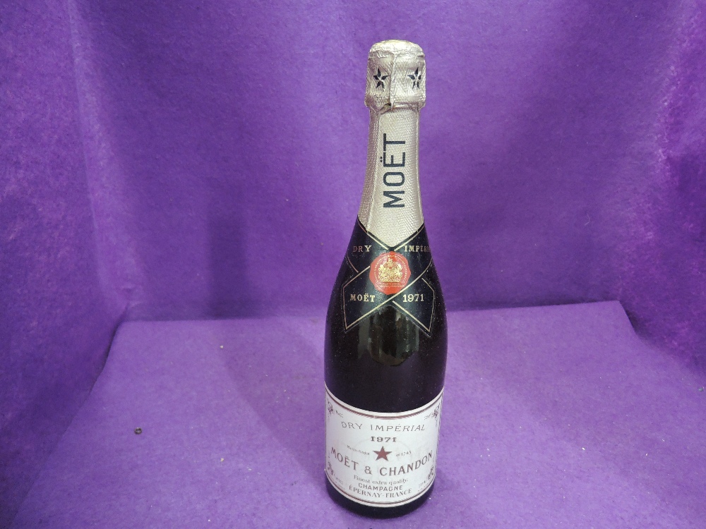 A bottle of Moet & Chandon 1971 Champagne, no strength of capacity on label