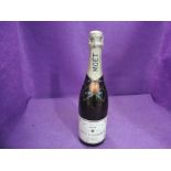 A bottle of Moet & Chandon 1971 Champagne, no strength of capacity on label