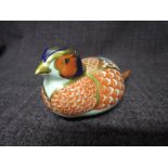 A Royal Crown Derby Paperweight. Pheasant modelled by Robert Jefferson and decoration design by