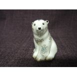 A Royal Crown Derby paperweight. Sitting Polar Bear Cub - Alice, modelled by Robert Tabbenor and