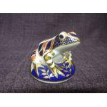 A Royal Crown Derby paperweight. A Frog modelled by Robert Jefferson decoration design by Brian