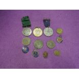 A small collection of Medals, Badges and Tokens including Volunteer Long Service Medal 1/VB Lancs