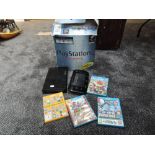 A Nintendo Wii U console with hand held controller and four games, Super Mario Maker, 3D World,