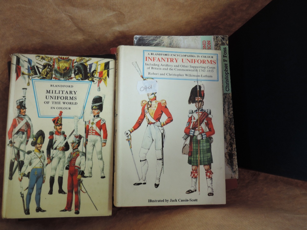 A collection of military reference books including Uniforms, Flags, Badges, Insignia, including 11