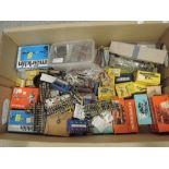 A box of Marklin, Faller and similar HO scale electric signals, points, lamps, control items and