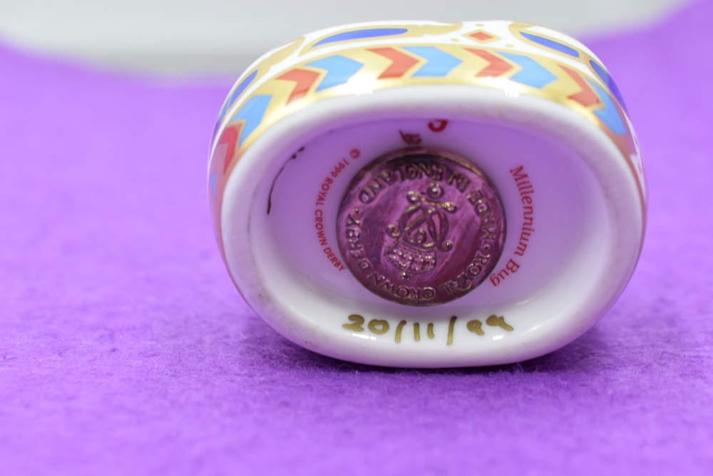 A Royal Crown Derby paperweight. Millenium Bug modelled and decoration design by John Ablitt. - Image 2 of 2