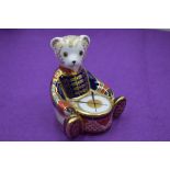 A Royal Crown Derby Paperweight. Drummer Bear modelled and decoration design by John Ablitt. Dated