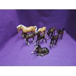 Eight Beswick studies, Stocky Jogging Mare, palomino 855, various foals in brown and one in