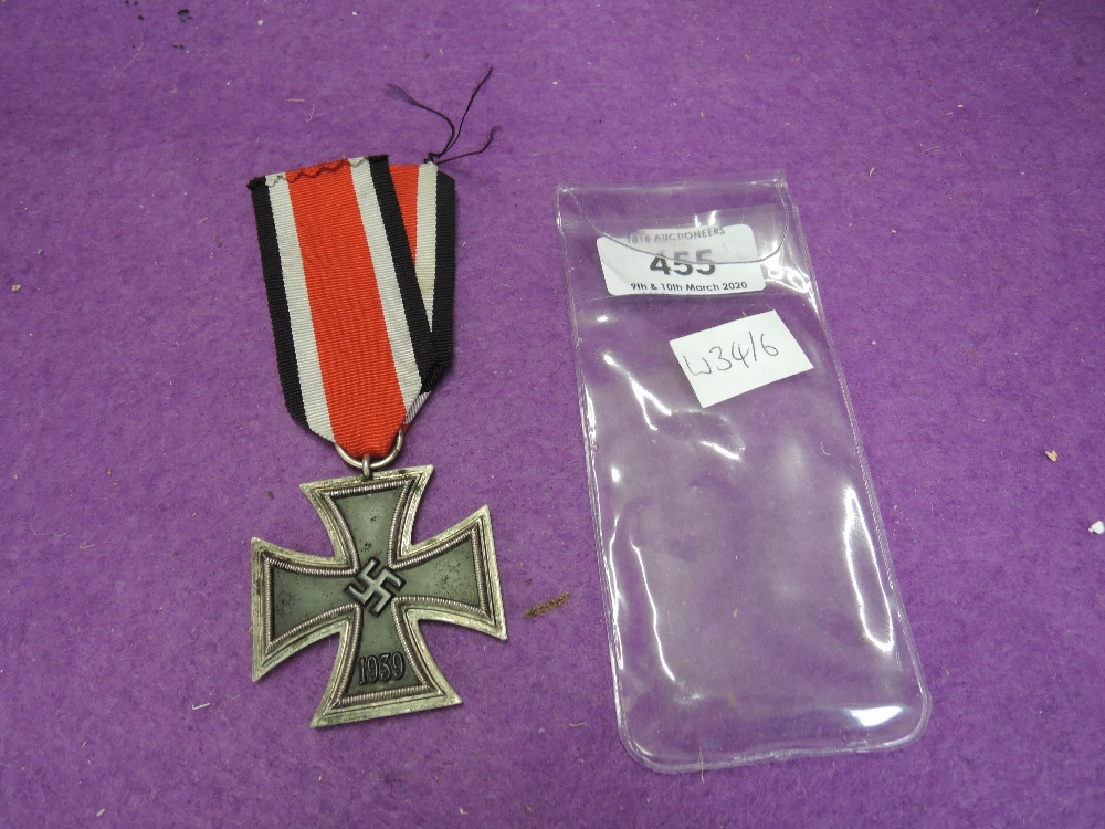 A German WW2 Iron Cross with ribbon 1939/1813