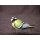 A Royal Crown Derby Paperweight. Great Tit modelled by David Brindley and decoration design by Sue