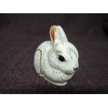A Royal Crown Derby Paperweight. Baby Bunny modelled by John Ablitt and decoration design by June