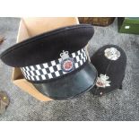 A Lancashire Constabulary Cap and Helmet both with badges