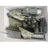 A collection of Corgi, Dinky, Solido and similar playworn military vehicles