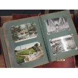 Two vintage postcard albums containing approximately five hundred vintage postcards