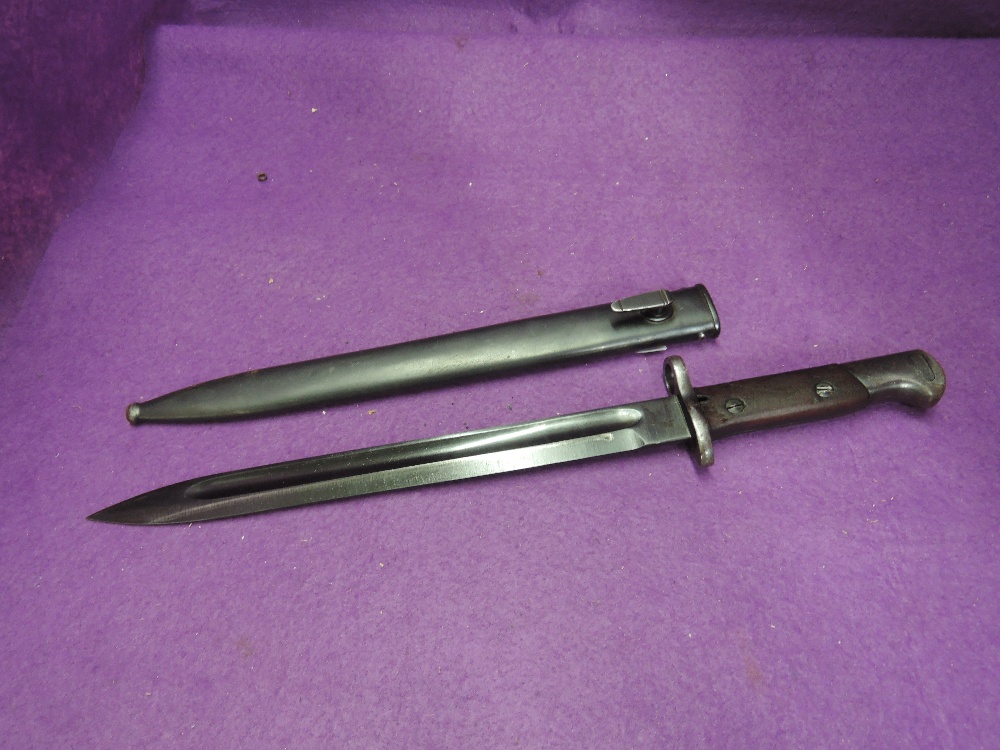 A German Mauser Export bayonet 1920's-30's with metal scabbard, by Simons & Co, J6975 on handle