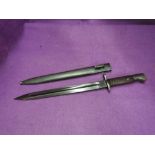 A German Mauser Export bayonet 1920's-30's with metal scabbard, by Simons & Co, J6975 on handle