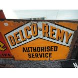 A partial enamel advertising sign for Delco Remy