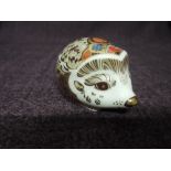 A Royal Crown Derby Paperweight. Bramble Baby Hedgehog modelled and decoration design by John