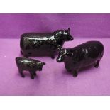 Three Beswick studies, Aberdeen Angus Family, Bull 1562, Cow 1563 and Calf 1827A