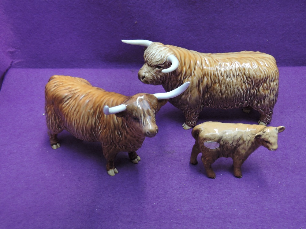 Three Beswick studies, Highland Family, Bull 2008, Cow 1740 (af) and Calf 1827B